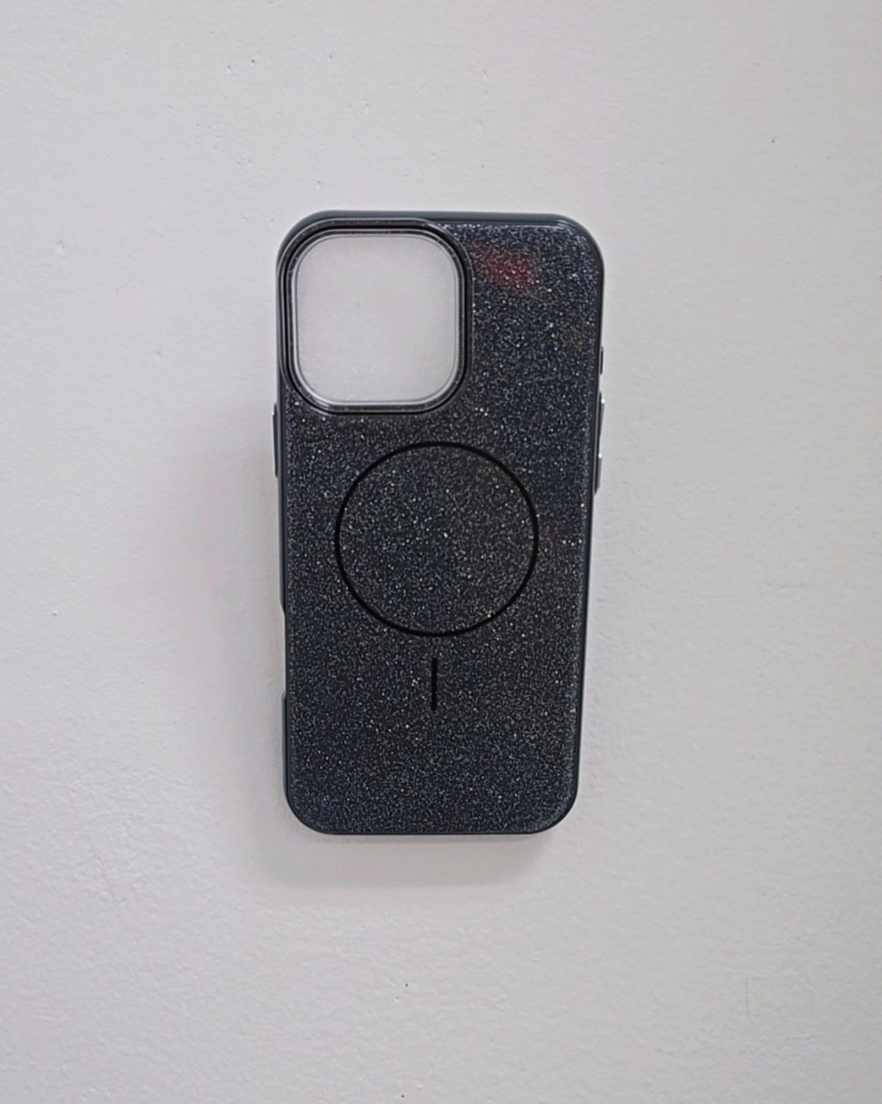 Black phone case with a textured finish on a light gray background